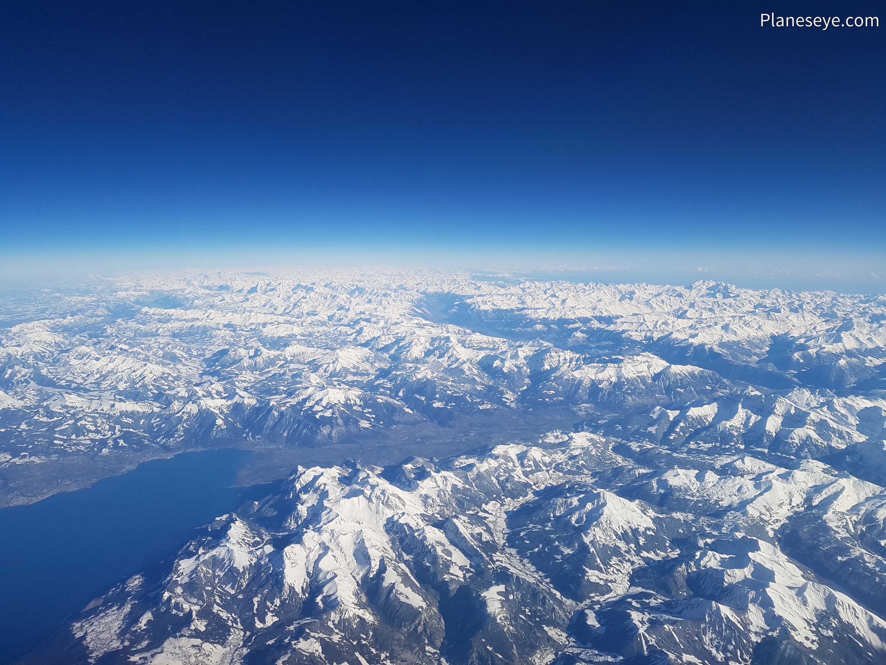 Alps from the West during daytime, Eastern part of Lake Geneva