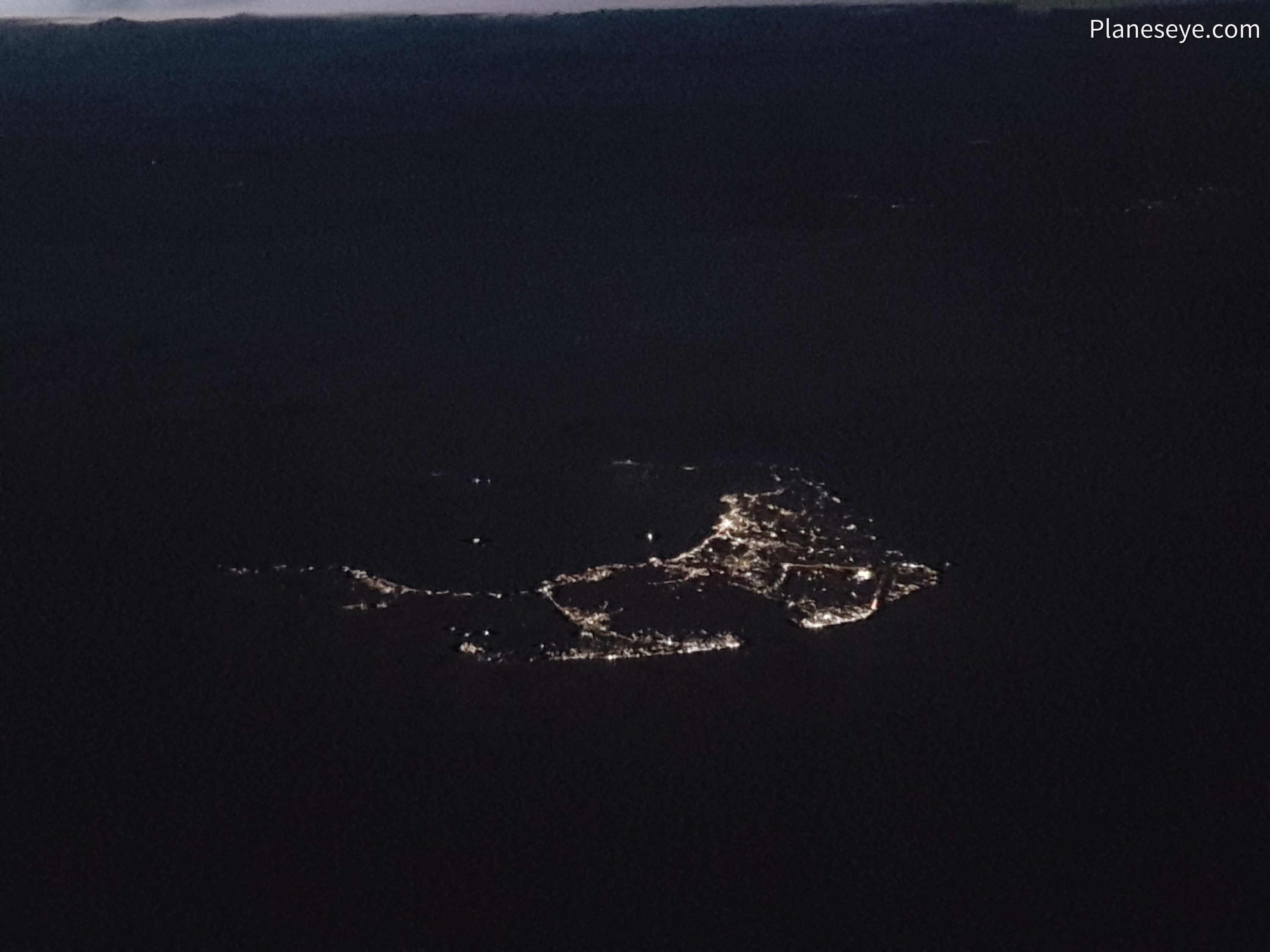 Aegean Sea during nighttime, Santorini from the East