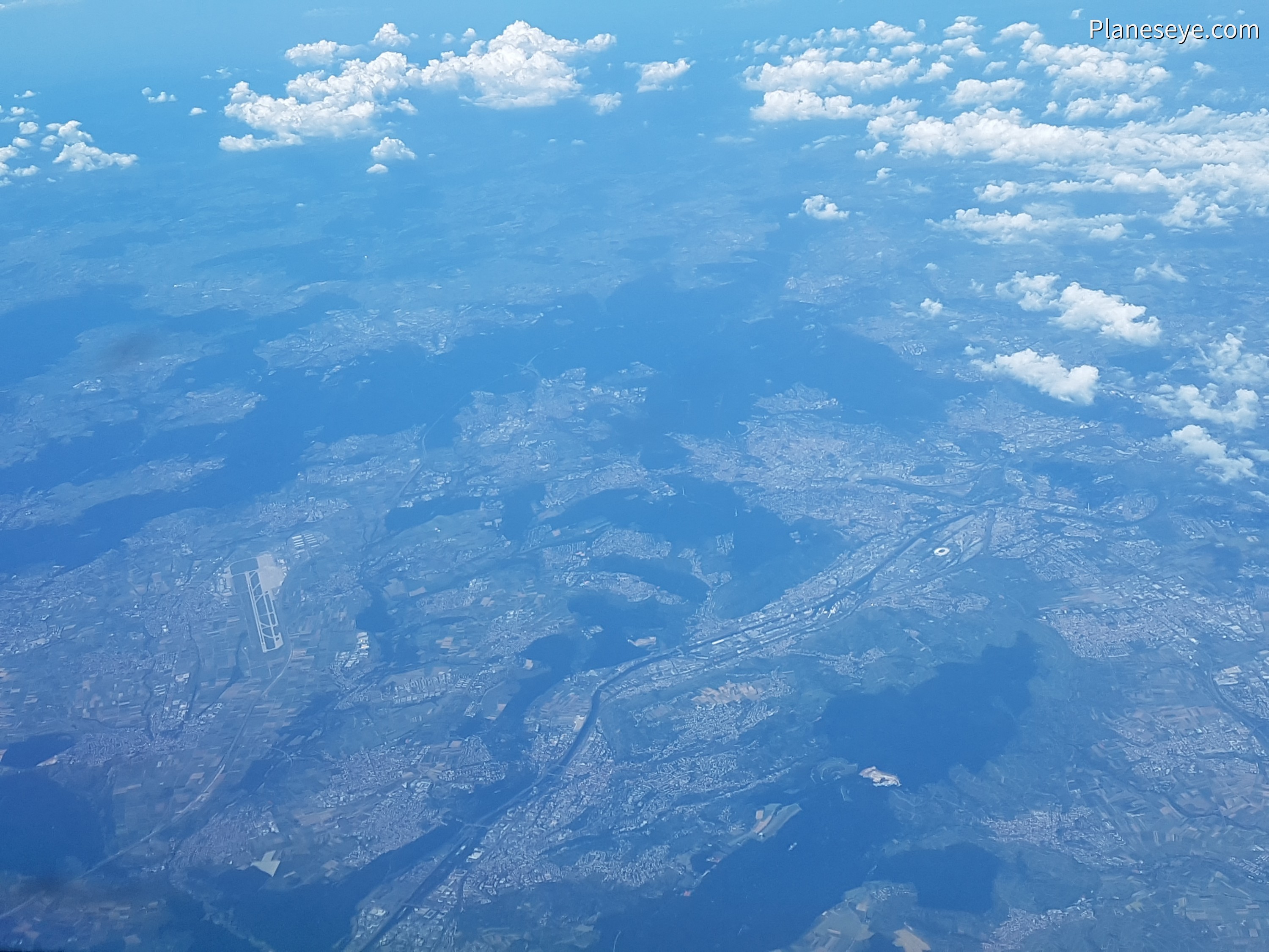 Stuttgart and STR Airport during the day, from high altitude