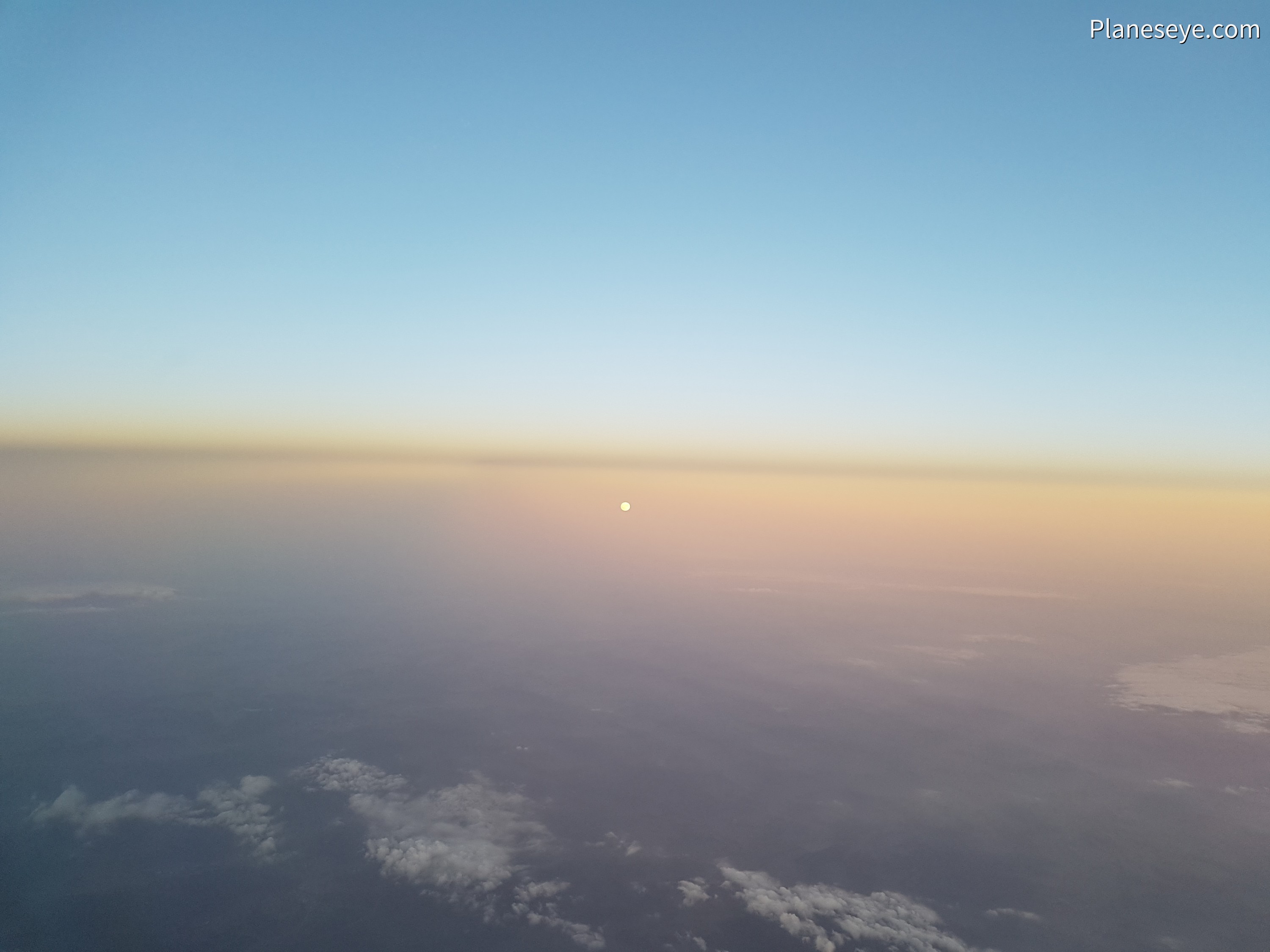 Moonrise over Germany during dusk